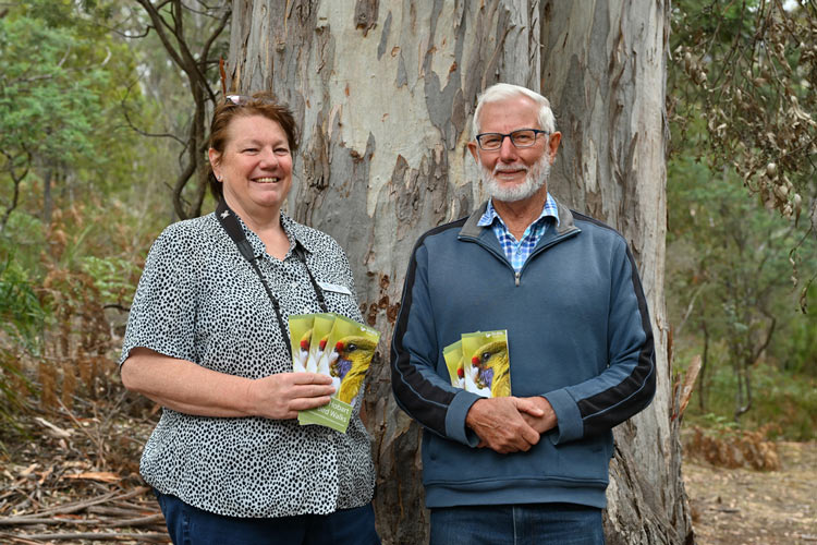 BirdLife Tasmania convenor Karen Dick and brochure author Andrew Walter show off their new bird walks brochure in Waterworks Reserve